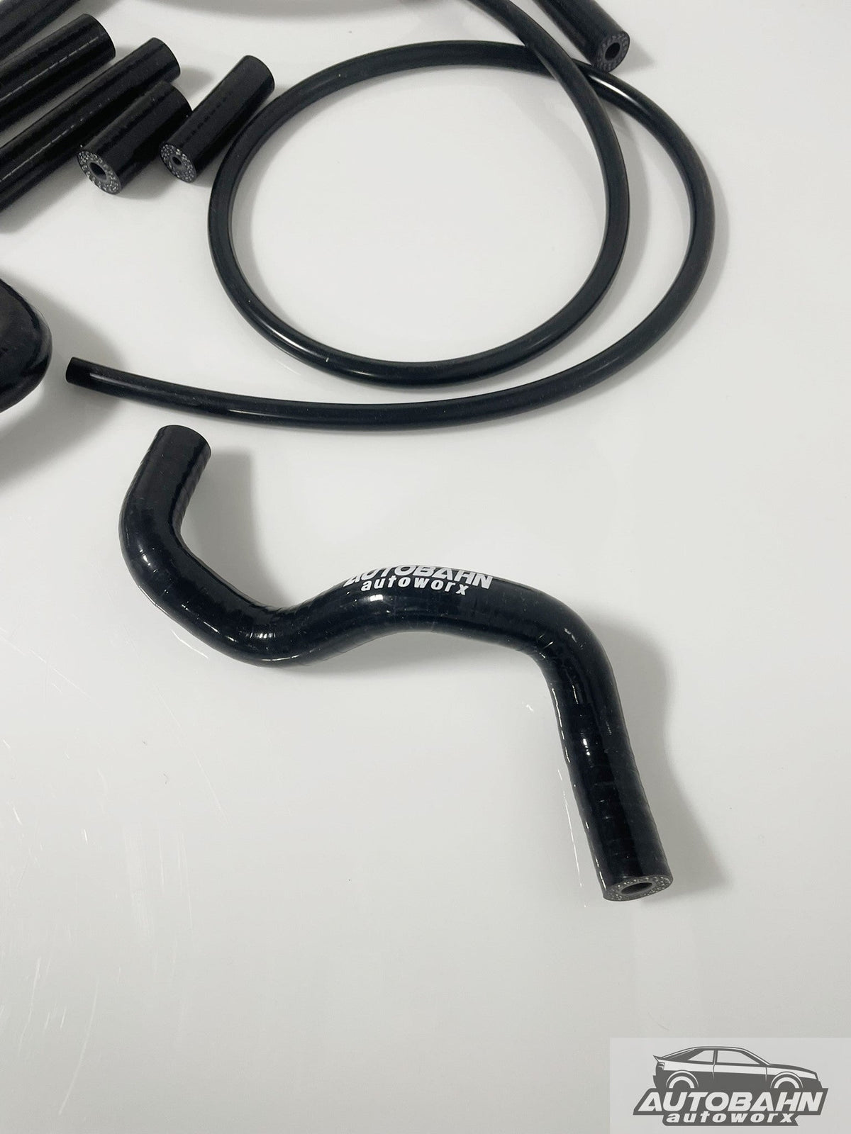 Autobahn Autoworx Audi A4 B8 TSI 2.0T vacuum and evap hose kit with black rubber hoses for engine maintenance.