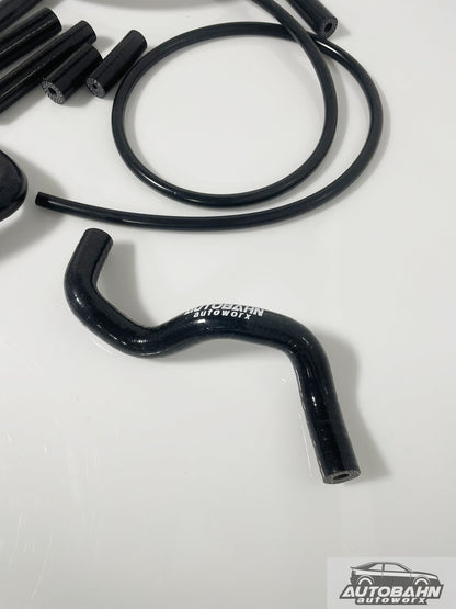 Autobahn Autoworx Audi A4 B8 TSI 2.0T vacuum and evap hose kit with black rubber hoses for engine maintenance.