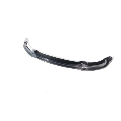 Carbon fiber Vorsteiner front lip for BMW F80 M3 and F82/F83 M4, showing sleek, lightweight aerodynamic design.