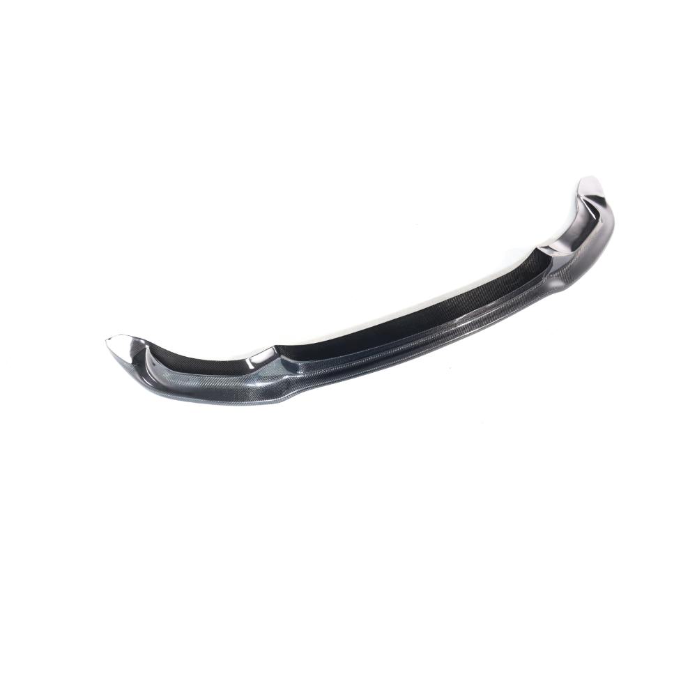 Carbon fiber Vorsteiner front lip for BMW F80 M3 and F82/F83 M4, showcasing sleek, lightweight performance enhancement.