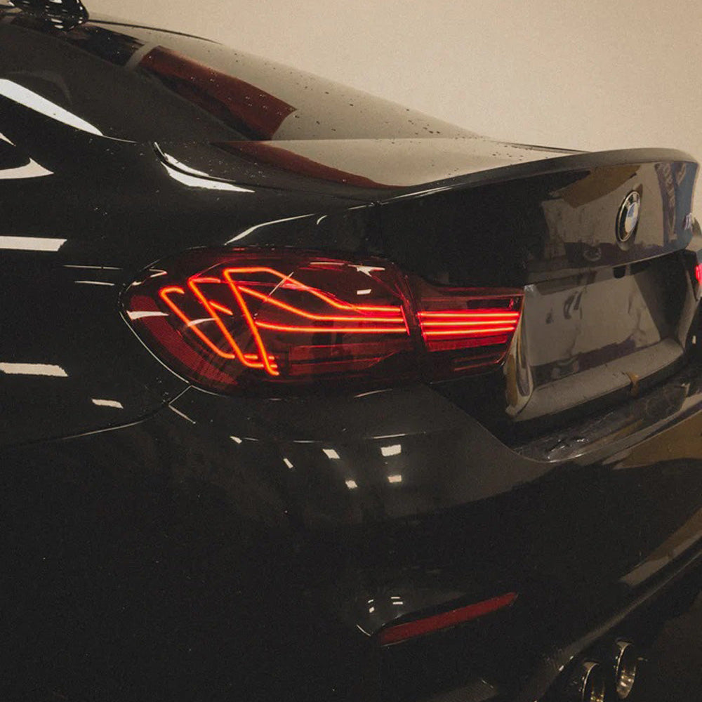 Palenon Performance CSL laser tail lights for BMW F82 M4 and F32 430i, 435i, 440i, 420i, 428i, rear view with illuminated LEDs