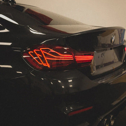 Palenon Performance CSL laser tail lights for BMW F82 M4 and F32 430i, 435i, 440i, 420i, 428i, rear view with illuminated LEDs