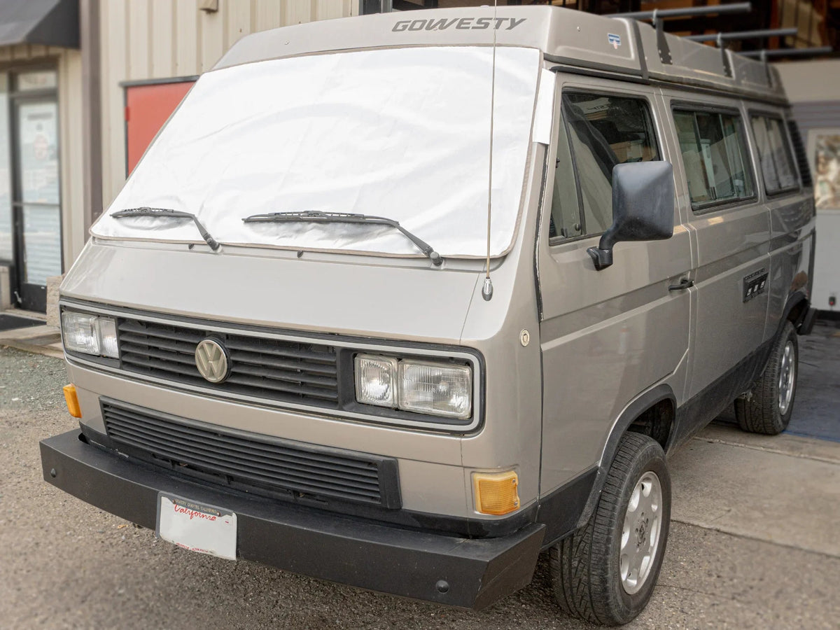 GoWesty Snow & Sun Shade window cover installed on Vanagon, providing sun protection and privacy for the vehicle's windows.