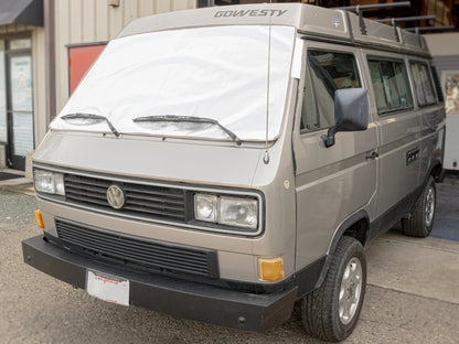 GoWesty Snow & Sun Shade window cover installed on Vanagon, providing sun protection and privacy for the vehicle's windows.