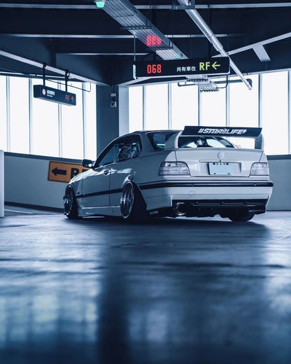 BMW E36 coupe/convertible tail lights by K2 Industries, clear custom design for 1992-1999 models, shown in the image