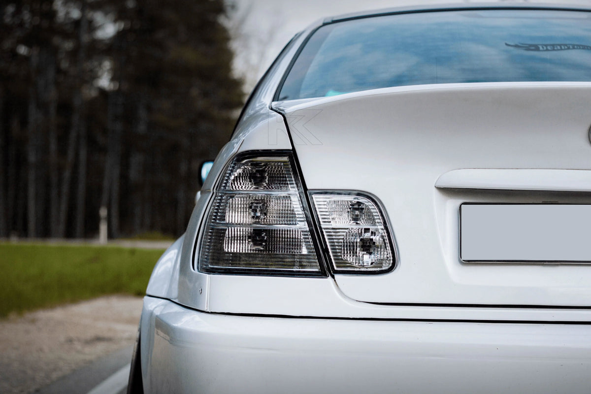BMW 3-Series E46 coupe tail lights by K2 Industries, clear lens design, showing the left and right tail light assemblies.