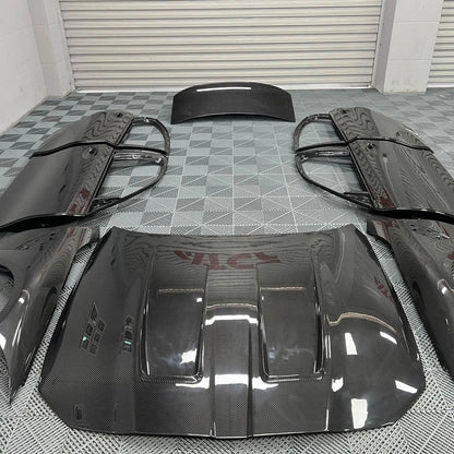 K2 Industries BMW 3 Series G20 G80 M3 carbon fiber doors installed on a 2019+ model, showcasing sleek carbon fiber finish and design.