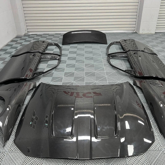 K2 Industries BMW 3 Series G20 G80 M3 carbon fiber doors installed on a 2019+ model, showcasing sleek carbon fiber finish and design.