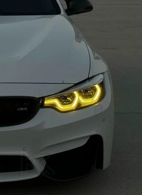 K2 Industries BMW 3/4 Series M3 F80 M4 F82 F83 LCI DRL module installed in vehicle's front lighting system, 2013-2019