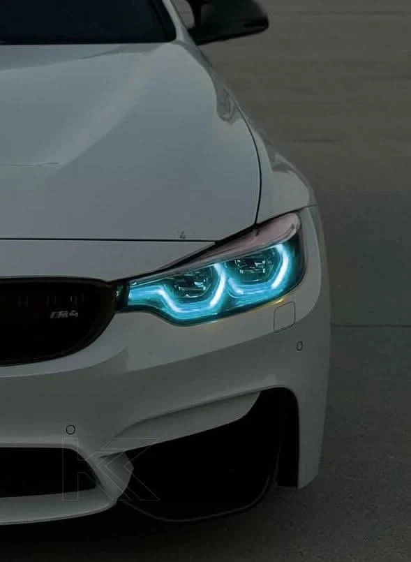 K2 Industries BMW 3/4 Series M3 F80 M4 F82 F83 F32 F33 F36 LCI DRL module installed in a vehicle, showcasing bright LED daytime running lights.