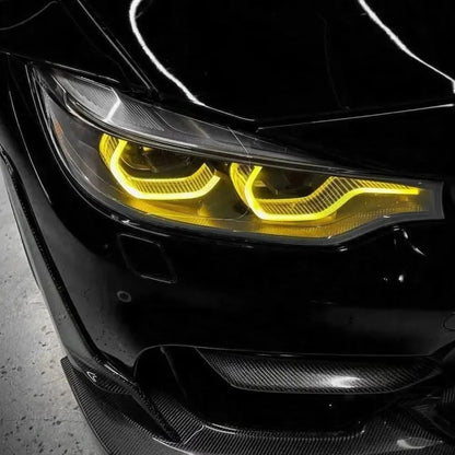 K2 Industries BMW 3/4 Series M3 F80 M4 F82 F83 F32 F33 F36 LCI DRL module installed in vehicle, showcasing bright daytime running lights.