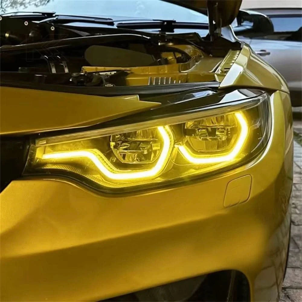 K2 Industries BMW 3/4 Series M3 F80 M4 F82 F83 F32 F33 F36 LCI DRL module installed in vehicle, showing bright daytime running lights.