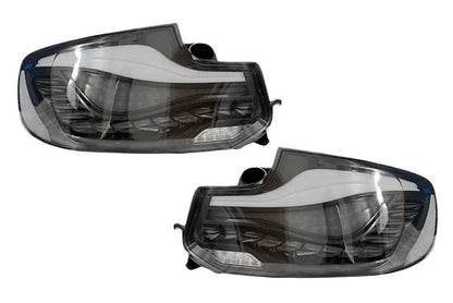BMW 2 Series and M2 GTS style OLED tail lights by K2 Industries, showcasing sleek, modern design with illuminated LED features.