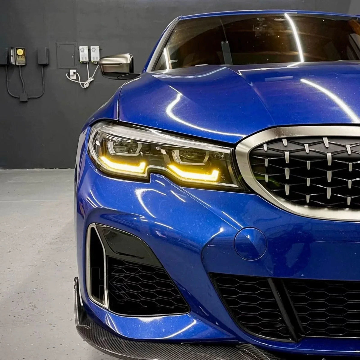 BMW 3 Series G20 DRL headlight modules by K2 Industries, featuring vibrant yellow daytime running lights for 2019-2022 models.