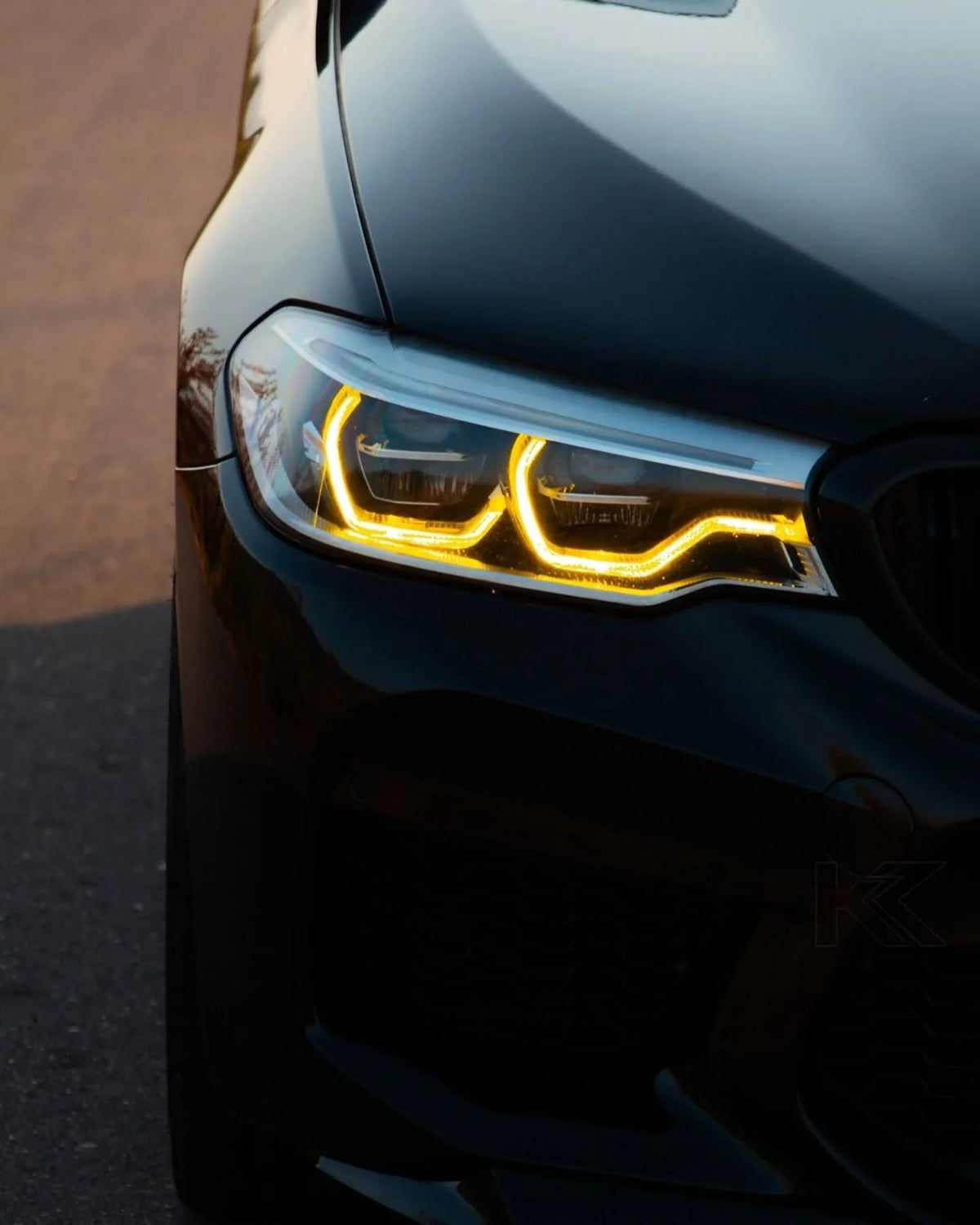 K2 Industries BMW 5 Series G30 G31 G38 CSL Vibrant DRL Module installed on vehicle, showcasing bright daytime running lights.