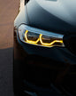 K2 Industries BMW 5 Series G30 G31 G38 CSL Vibrant DRL Module installed on vehicle, showcasing bright daytime running lights.