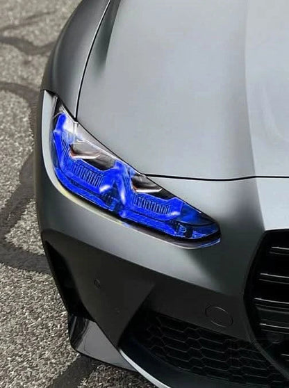 K2 Industries BMW 3/4 Series G80 G82 vibrant yellow DRL module installed on front of car, showcasing bright daytime running lights.