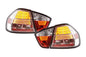 BMW 3-Series E90 sedan chrome LED taillights by K2 Industries, showing close-up of the sleek, reflective tail light design.