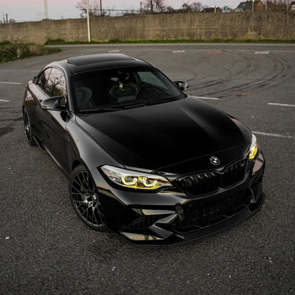 BMW 2 Series F87 DRL module by K2 Industries, shown mounted on the vehicle's front with LED daytime running lights.