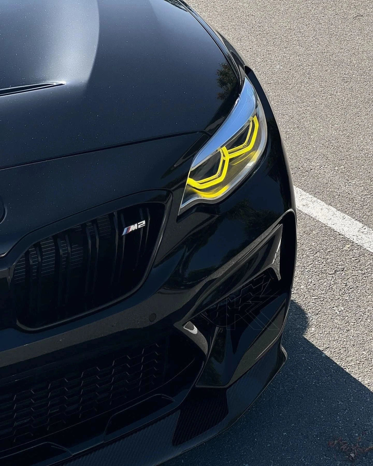 K2 Industries BMW 2 Series F87 DRL Module installed in a car, showing the LED daytime running lights for models 2014-2021.
