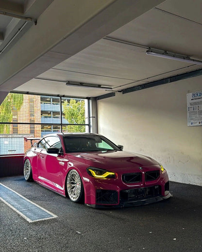K2 Industries BMW 2 Series M2 G42 G87 DRL module installed in the vehicle's front lighting system.