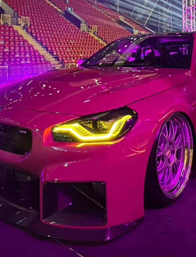 K2 Industries BMW 2 Series M2 G42 G87 DRL module installed in vehicle showing bright daytime running lights.