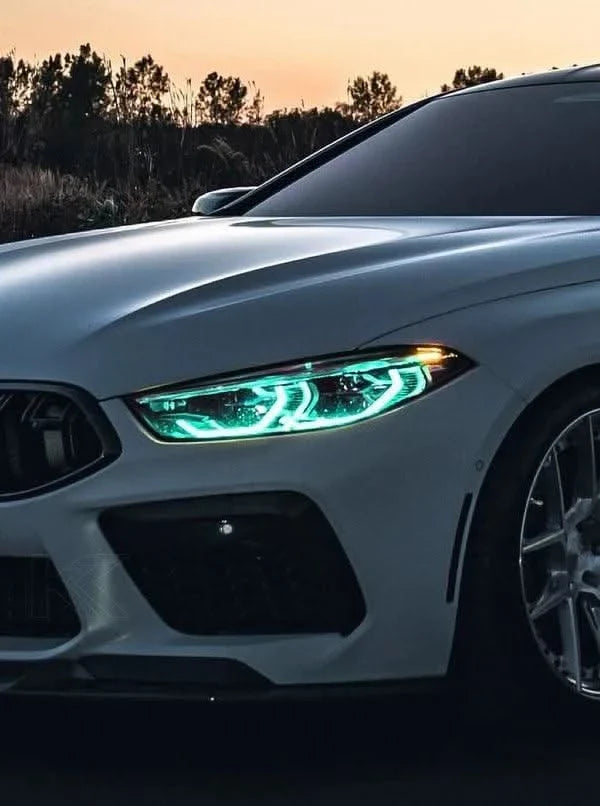 K2 Industries BMW 8 Series M8 G14/F91 G15/F92 G16/F93 CSL DRL module installed on front of car, close-up view showcasing LED daytime running lights.