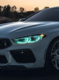 K2 Industries BMW 8 Series M8 G14/F91 G15/F92 G16/F93 CSL DRL module installed on front of car, close-up view showcasing LED daytime running lights.