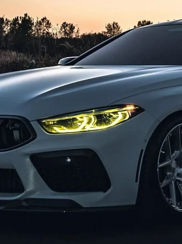K2 Industries BMW 8 Series M8 G14 F91 G15 F92 F93 CSL DRL module installed on vehicle with illuminated daytime running lights