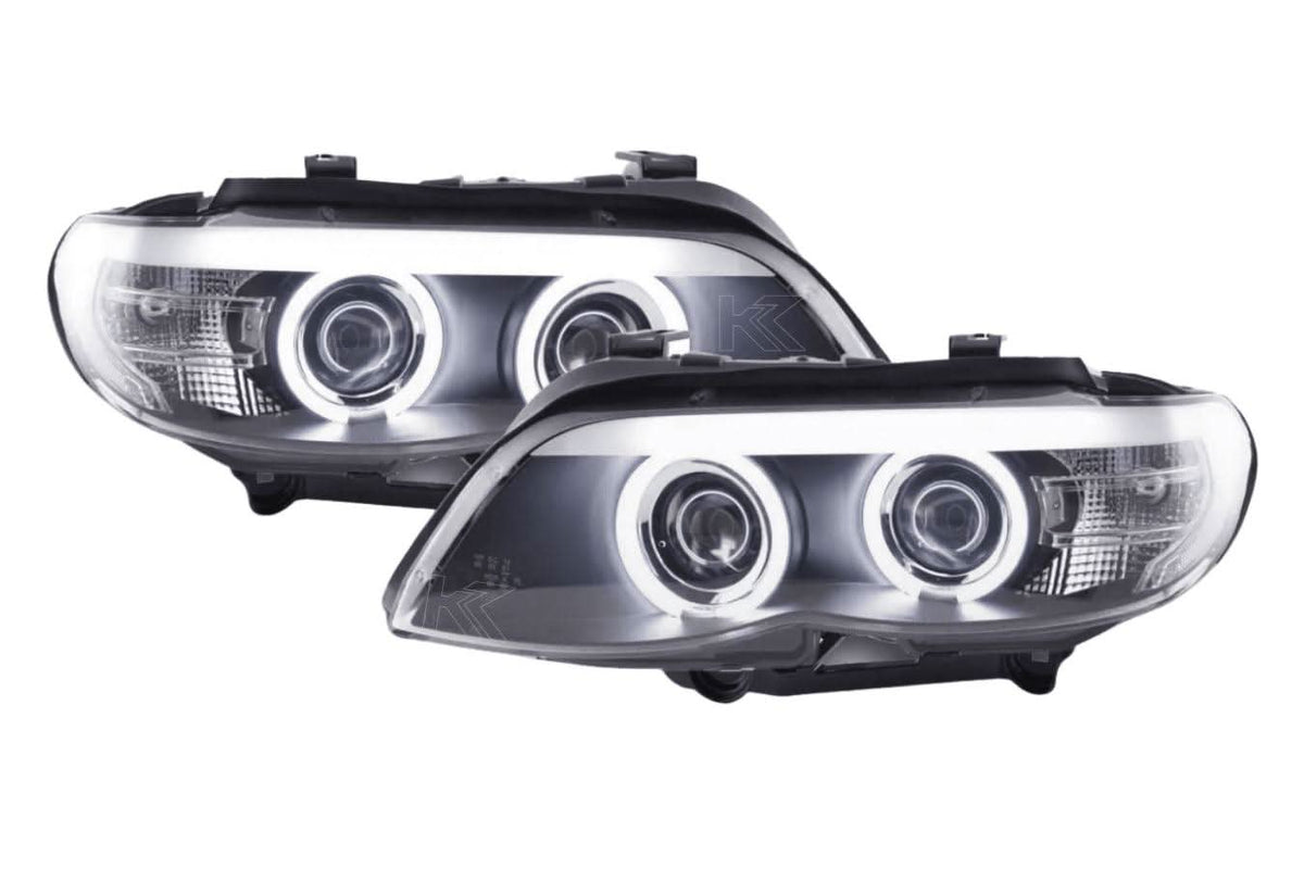 BMW X5 E53 headlights with black angel eyes and LED accents, manufactured by K2 Industries for 2003-2006 models.