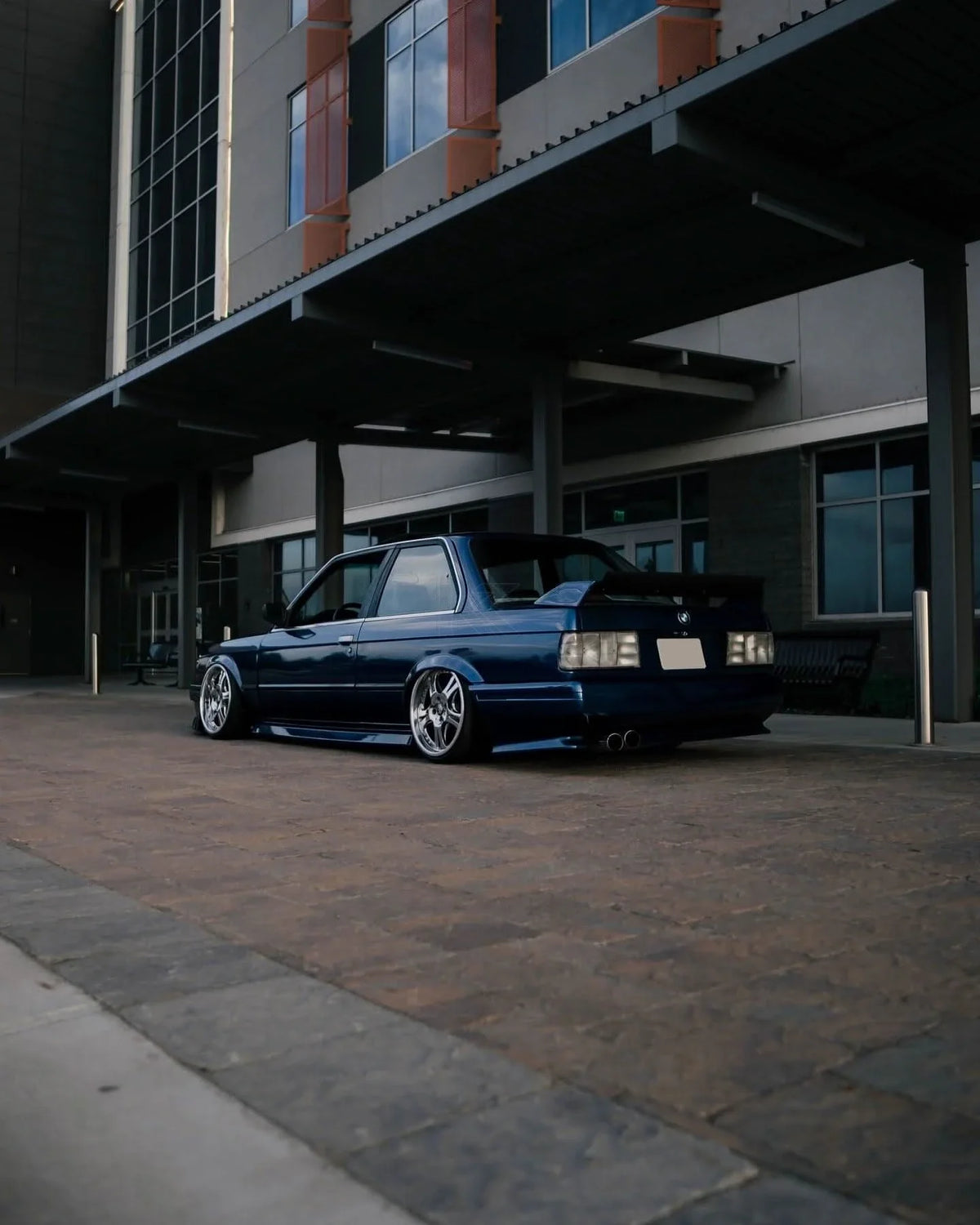 BMW 3 Series E30 facelift clear tail lights by K2 Industries, showing the sleek design and transparent lens of the rear lighting.