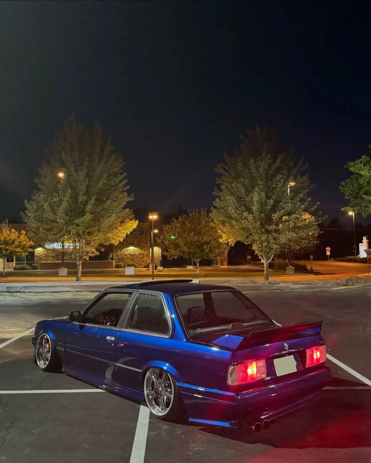 BMW 3 Series E30 facelift clear taillights by K2 Industries, showing the sleek design and transparent lens details.