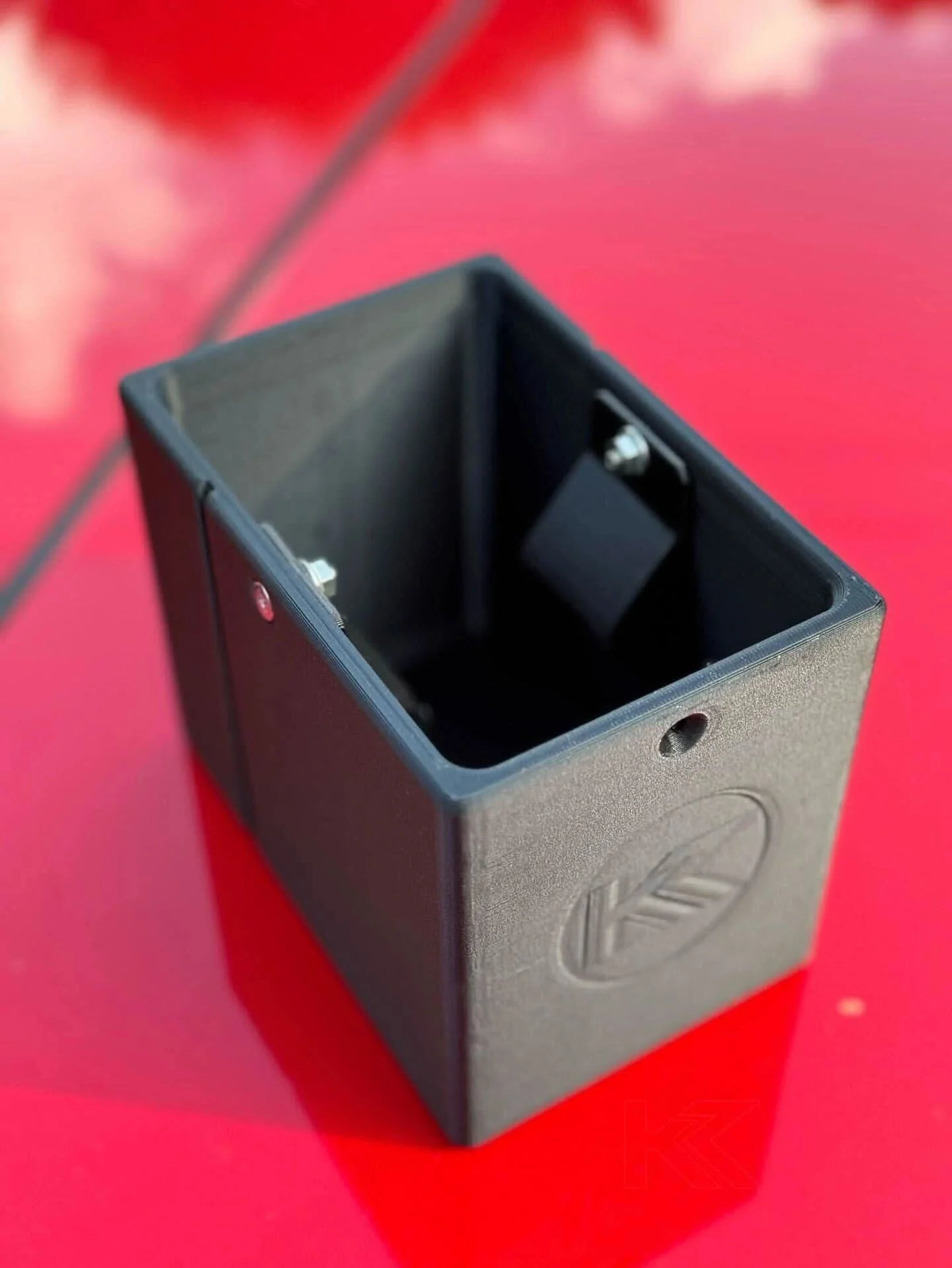 Black 3D printed plastic oil holder for BMW E36 Coupe, Sedan, Compact Series 3 by K2 Industries, 1991-2000.