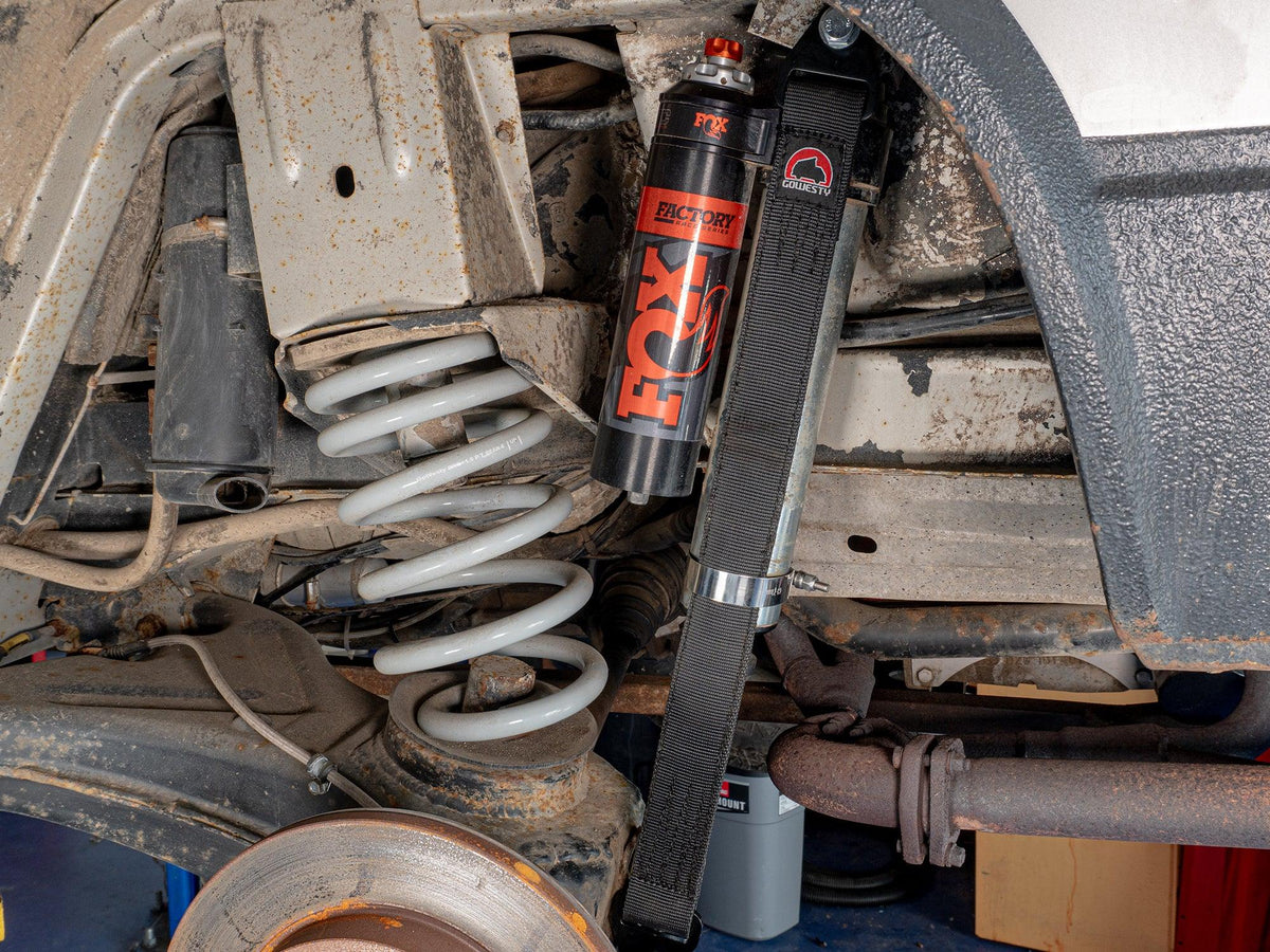 Rear 23-inch GoWesty Suspension Limit Strap Set for 2WD Vanagon, showing the installed straps on the vehicle suspension system.