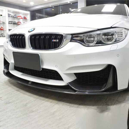 Carbon fiber front lip for BMW F80 M3 and F82 M4 by Palenon Performance, showcasing sleek, aerodynamic design on the vehicle.