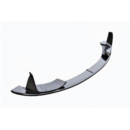 Carbon fiber front lip for BMW F80 M3 and F82 M4, F83 M4 by Palenon Performance, shown on a sleek black BMW.