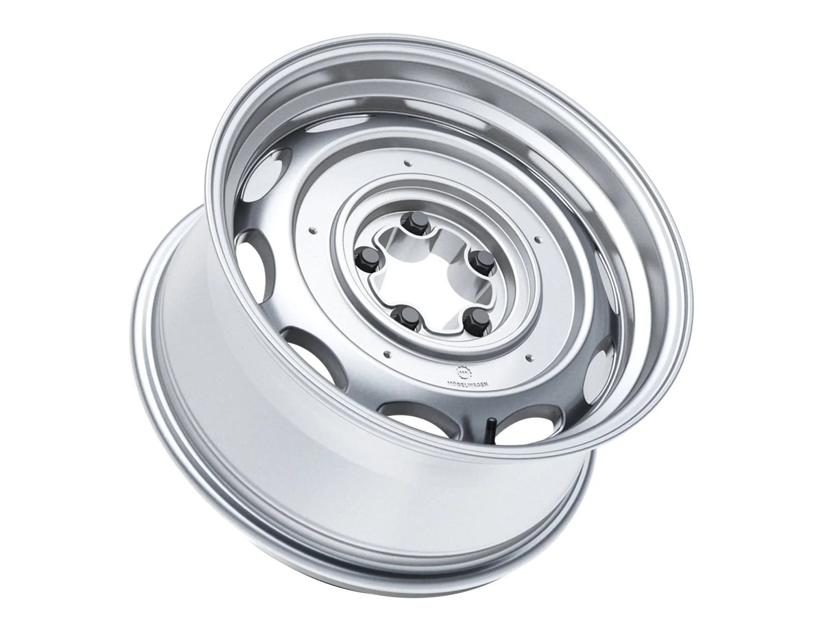 Silver 16-inch alloy wheel for Mobelwagen Interceptor bus and Vanagon by GoWesty, featuring a sleek, durable design.