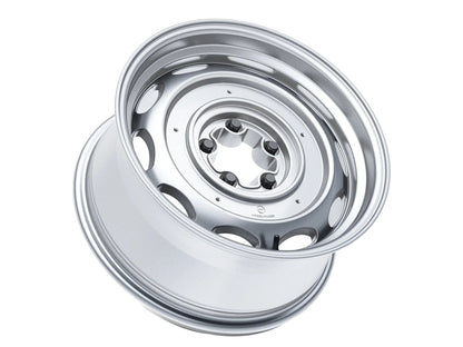 Silver 16-inch alloy wheel for Mobelwagen Interceptor bus and Vanagon by GoWesty, featuring a sleek, durable design.