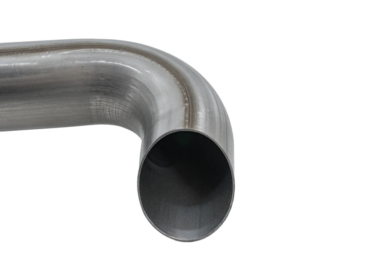 GoWesty stainless muffler and saddle bundle for Vanagon sport exhaust system, showing polished metal components and mounting parts.