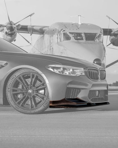 BMW 5 Series F90 M5 carbon fiber front lip by K2 Industries, showcasing a sleek 3D style design on the vehicle's front bumper.