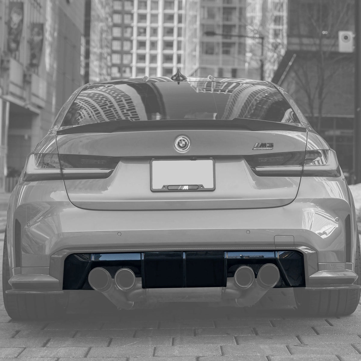 BMW 3 Series G80 M3 G82 G83 M4 Euro version carbon fiber rear diffuser by K2 Industries, shown in black with textured surface.