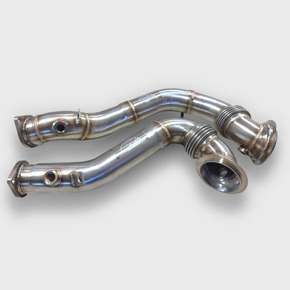 Palenon Performance N54 racing downpipe for BMW 1M, 135i, 335i, 335is, and 335xi models, showing the metal pipe and flanges.