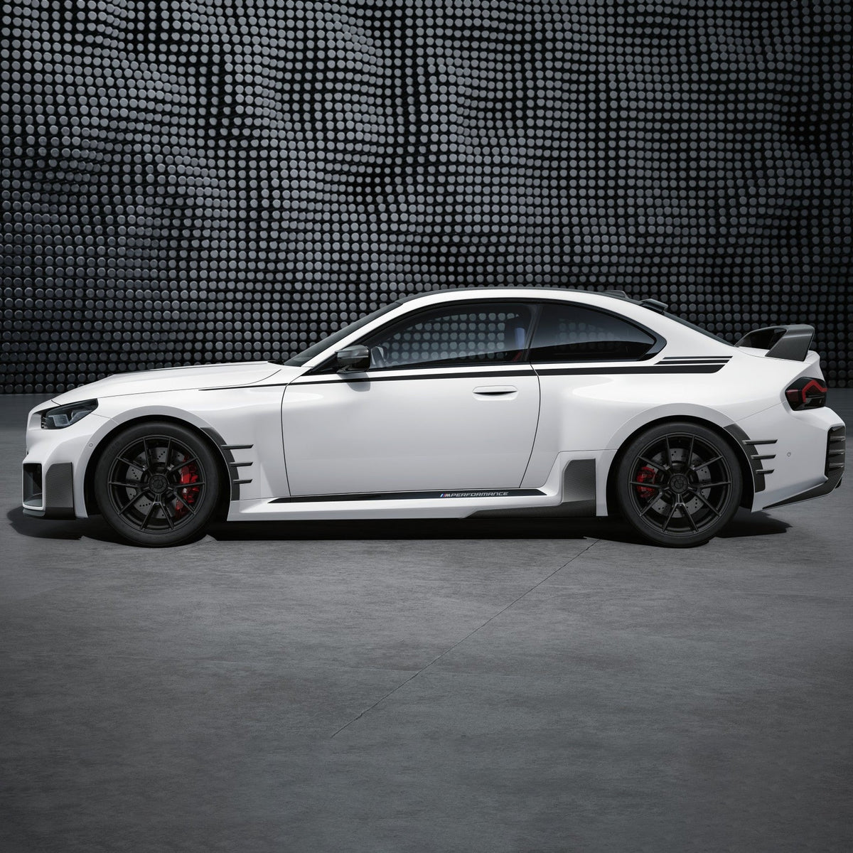 Carbon fiber M Style front lip for BMW M2 G87 by Palenon Performance, featuring sleek design and aerodynamic details.