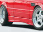 K2 Industries BMW E30 Sedan/Wagon side skirts V2 installed on vehicle, showcasing sleek aerodynamic design and fitment details.