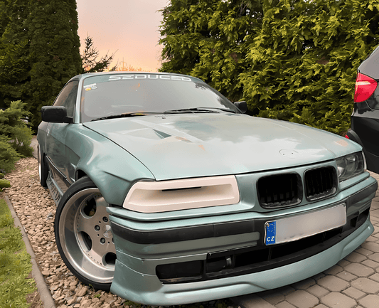 K2 Industries BMW 3 Series E36 headlight duct, "The Eye," for models 1990-1999, shown in a close-up photo.