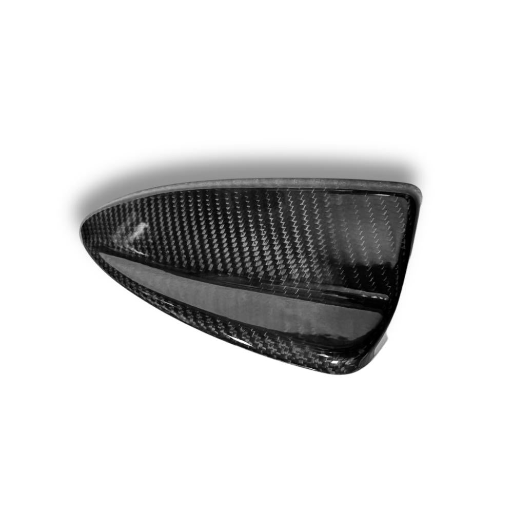 Carbon fiber roof antenna cover for BMW E46, E90, E91, E92, E93 by Palenon Performance, showing sleek, textured exterior finish.