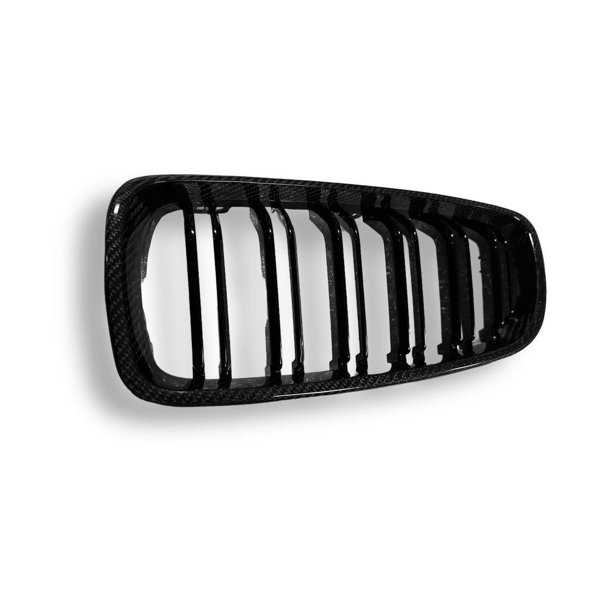 Carbon fiber grille for BMW F80 M3, F82 M4, F32, and F33 models by Palenon Performance, featuring a sleek, lightweight design.