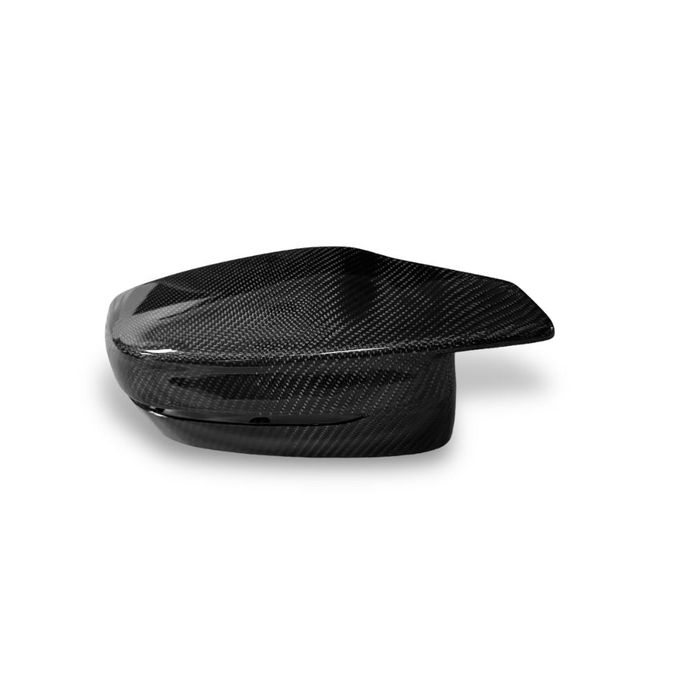 Carbon fiber mirror caps for BMW G80 M3 and G82/G83 M4, OEM style, by Palenon Performance, shown on vehicle mirror.