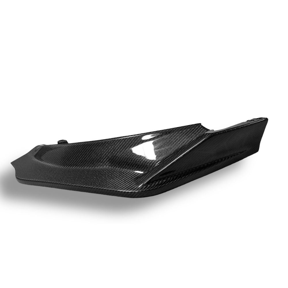 Carbon fiber V Style front lip for BMW G80 M3, G82 M4, G83 M4, designed by Palenon Performance, shown on a sleek BMW model.
