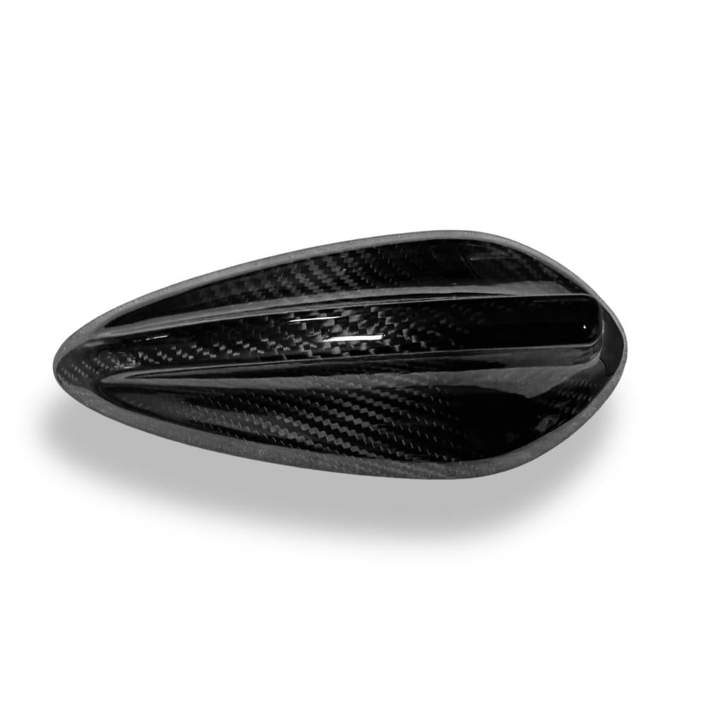 Black carbon fiber roof antenna cover for BMW F20, F45, F15, F16, F85, F86, G01, and E84 models by Palenon Performance.